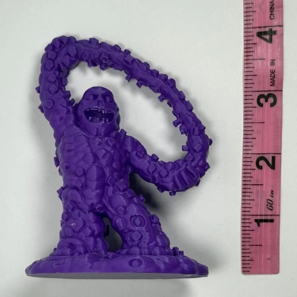 The magnetic monster, classic movie, monster toy, solid purple plastic